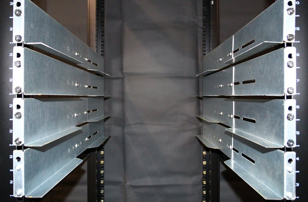 Multiple galvanized American Rails installed symmetrically in a server cabinet